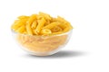 Raw organic pasta in a glass bowl isolated on a white Royalty Free Stock Photo