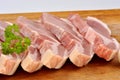 raw organic pork chop and parsley