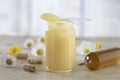 Raw organic royal jelly in a small bottle Royalty Free Stock Photo