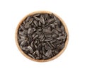 Raw organic sunflower seeds in wooden bowl isolated on white, top view Royalty Free Stock Photo