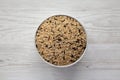 Raw Organic Wild Rice in a Bowl on a white wooden background, top view Royalty Free Stock Photo