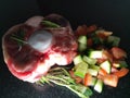 Raw oxtail meat with fresh vegetables Royalty Free Stock Photo