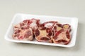 Raw Oxtail on Styrofoam Plate Royalty Free Stock Photo