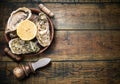 Raw oysters on the old wooden table.