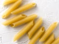 raw pasta penne on white background Royalty Free Stock Photo