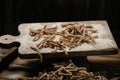 Raw pasta busiate on wooden table Royalty Free Stock Photo