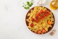 Raw pasta with cherry tomatoes in a plate, food banner