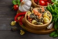 Raw pasta with fresh cherry tomatoes, basil, chili pepper and garlic for Italian food. Royalty Free Stock Photo