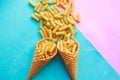 Raw pasta in ice cream waffle cones. Italian traditional food concept