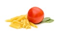 Raw pasta, tomatoes and leaves of spinach on white Royalty Free Stock Photo