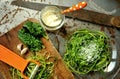 Raw pasta with zucchini and spinach pesto with garlic