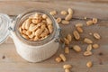 Raw peanuts in glass jar