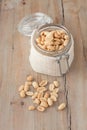 Raw peanuts in glass jar Royalty Free Stock Photo