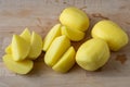 Raw peeled and sliced potatoes on cutting board Royalty Free Stock Photo