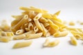 Raw penne pasta isolated on white background. AI generated Royalty Free Stock Photo