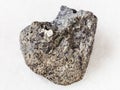 raw peridotite stone with phlogopite mica on white Royalty Free Stock Photo