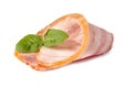 Raw piece of fresh bacon with basil leaf green isolated on a white background Royalty Free Stock Photo