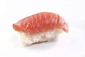 Raw piece of Nigiri sushi with rice and salmon