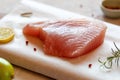 Cooking of raw piece of tuna albacore fish