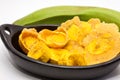 Raw plantain cups, patacones and pieces Royalty Free Stock Photo