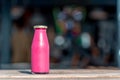 Raw pomegranate juice in glass bottle