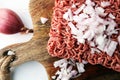 Raw pork and beef ground meat and vegetables. Royalty Free Stock Photo