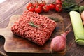 Raw pork and beef ground meat and vegetables. Royalty Free Stock Photo