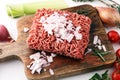 Raw pork and beef ground meat and vegetables. Royalty Free Stock Photo