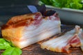 Raw pork belly with skin, fat bacon tray with spices and herbs, close up Royalty Free Stock Photo