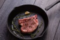 Raw pork chop in pan Royalty Free Stock Photo