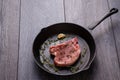 Raw pork chop in pan Royalty Free Stock Photo