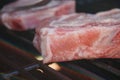 Raw Pork Chops Cooking On Bbq Royalty Free Stock Photo