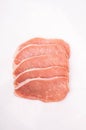 Raw pork chops, loin cutlets, isolated on a white background, top view. Packshot photo for package design. Royalty Free Stock Photo