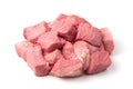 Raw pork cut into chunks on a white background.