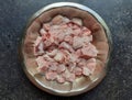 Raw chopped pork in a steel bowl