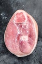 Raw pork ham cut. Leg meat. Black background. Top view Royalty Free Stock Photo