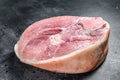 Raw pork ham cut. Leg meat. Black background. Top view Royalty Free Stock Photo