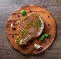 Raw Pork Loin chops marinated meat Steak for bbq on wooden table Royalty Free Stock Photo