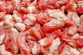 Raw pork meat cut into chunks, preparation for subsequent roasting, close-up, selective focus Royalty Free Stock Photo