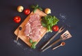 Raw pork meat. Fresh steaks on cutting board Royalty Free Stock Photo