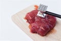 Raw pork and meat hammer Royalty Free Stock Photo