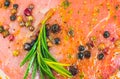 Raw Pork meat with spices and green rosemary herb. Red meat texture background, Raw ham. Macro photo. Fat Fresh juicy steak Royalty Free Stock Photo