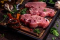 Raw pork meat steaks cooking background