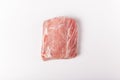 Raw pork meat on white background. Whole piece of meat. Flat lay, top view