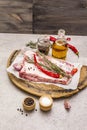 Raw pork ribs with rosemary, chili, garlic, salt and olive oil Royalty Free Stock Photo