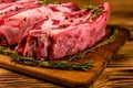 Raw pork ribs with spices and rosemary on a cutting board Royalty Free Stock Photo