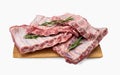 Raw pork ribs. Whole raw pork ribs on wooden board isolated background. Raw meat, farm and cooking concept. Meat shop Royalty Free Stock Photo