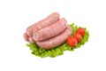 Raw pork sausages.Grilled sausages in close-up, isolated on a white background.Selective focus Royalty Free Stock Photo