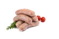 Raw pork sausages.Grilled sausages in close-up, isolated on a white background.Selective focus Royalty Free Stock Photo