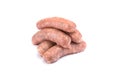 Raw pork sausages.Grilled sausages in close-up, isolated on a white background.Selective focus Royalty Free Stock Photo